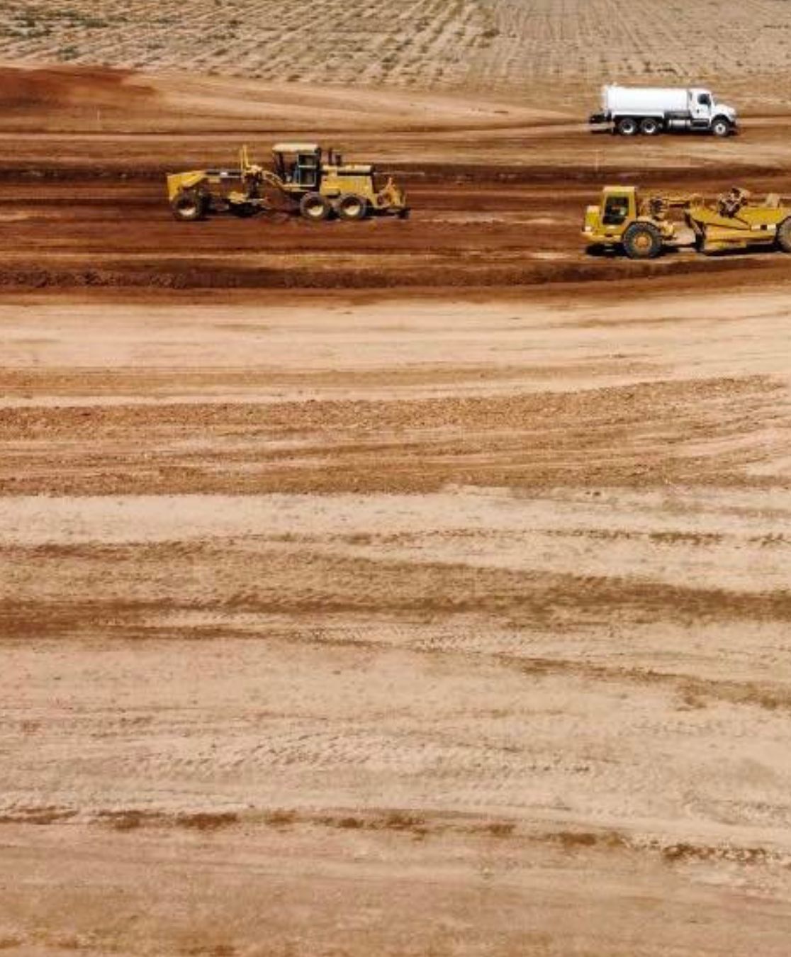 grading and excavating dirt